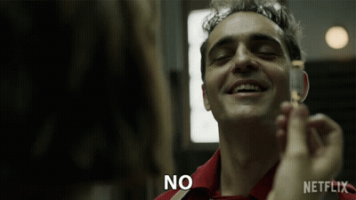 A Man In A Red Shirt Is Smiling With The Word No Written On His Face GIF