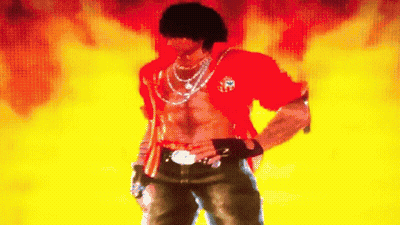 A Man In A Red Shirt Is Standing In Front Of A Yellow Background GIF