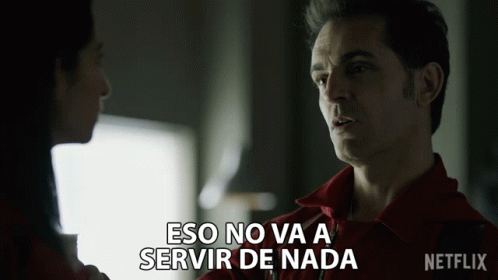 A Man In A Red Shirt Is Talking To A Woman With The Words Eso No Va A Servir De Nada Above Him GIF