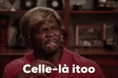 A Man In A Red Shirt Says " Celle-La Itoo " In White Letters GIF