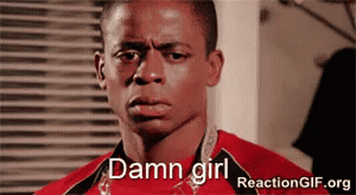A Man In A Red Shirt Says " Damn Girl " In Front Of A Window GIF