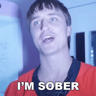 A Man In A Red Shirt Says " I 'M Sober " In White Letters GIF