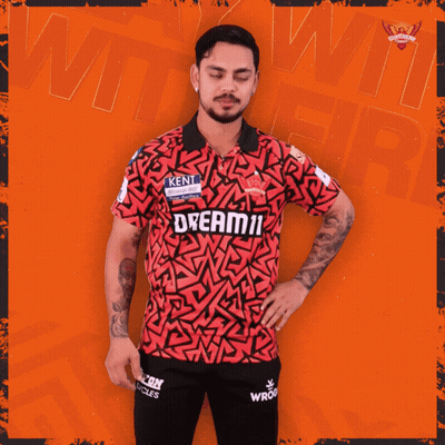 A Man In A Red Shirt That Says Dream11 GIF