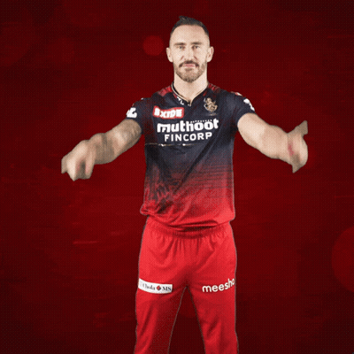 A Man In A Red Shirt That Says Muthoot Fincorp On It GIF