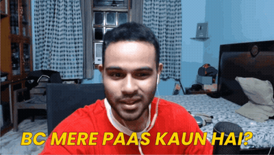 A Man In A Red Shirt With Ear Buds Is Asking Bc Mere Paas Kaun Hai GIF