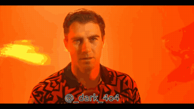 A Man In A Red Shirt With The Hashtag Dark 404 On The Bottom GIF