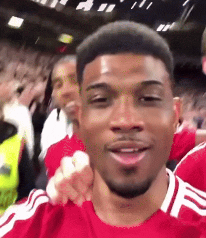 A Man In A Red Shirt With The Letter F On The Front GIF
