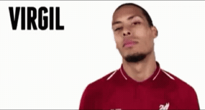 A Man In A Red Shirt With The Name Virgil Van Dijk Written On The Bottom GIF