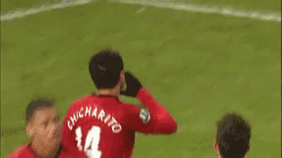 A Man In A Red Shirt With The Number 14 On It GIF