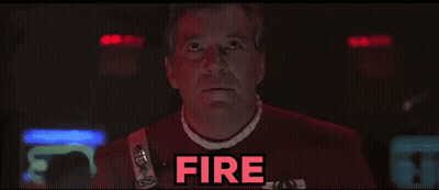 A Man In A Red Shirt With The Word Fire Written On It GIF