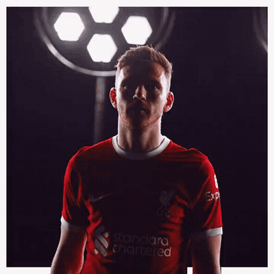 A Man In A Red Shirt With The Word Robinson On The Bottom GIF