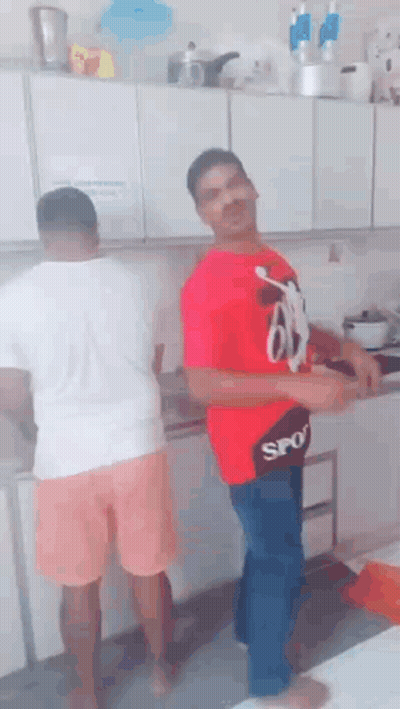 A Man In A Red Shirt With The Word Sport On It GIF
