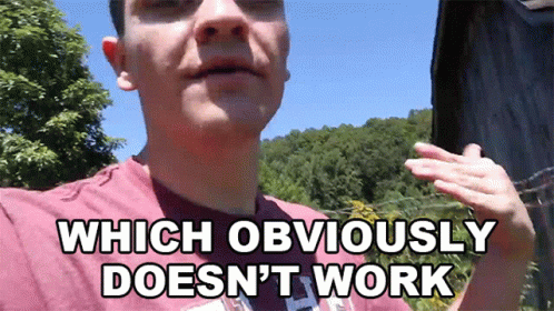 A Man In A Red Shirt With The Words Which Obviously Does N't Work Above Him GIF