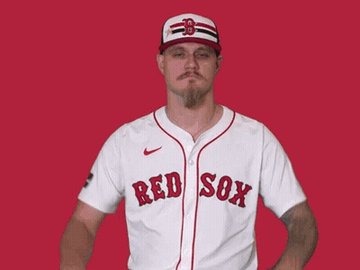 A Man In A Red Sox Jersey Giving A Thumbs Down Sign GIF