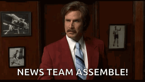 A Man In A Red Suit And Tie Is Giving A Thumbs Up And Says News Team Assemble GIF