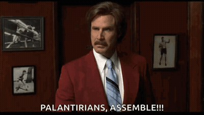 A Man In A Red Suit And Tie Is Saying " Palantirians Assemble !!! " GIF