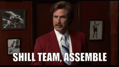 A Man In A Red Suit And Tie Is Saying " Shill Team Assemble " GIF