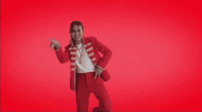 A Man In A Red Suit Is Dancing In Front Of A Red Background That Says ' Til Week End ' GIF