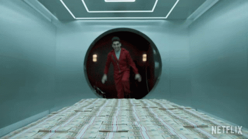 A Man In A Red Suit Is Running Through A Tunnel Filled With Stacks Of Money And A Netflix Logo GIF