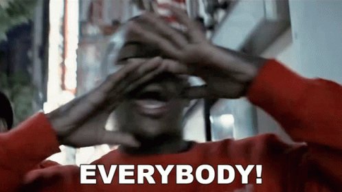 A Man In A Red Sweater Is Covering His Eyes With His Hands And Says Everybody ! GIF