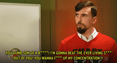 A Man In A Red Sweater Says " You Dumb Son Of A B " In Front Of A Whiteboard GIF
