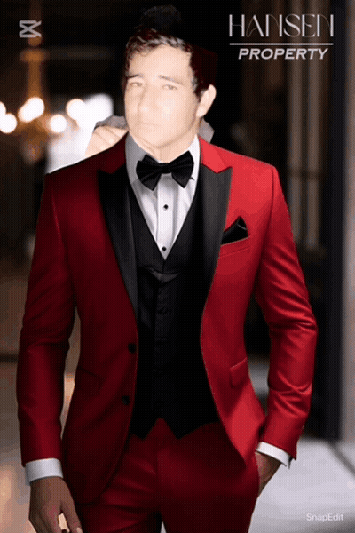 A Man In A Red Tuxedo With Hansen Property On The Bottom GIF