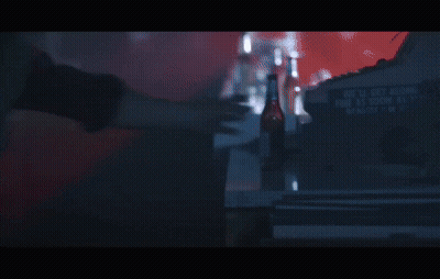 A Man In A Red Varsity Jacket Has The Letter S On His Chest GIF