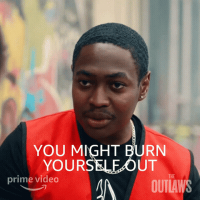 A Man In A Red Vest With The Words " You Might Burn Yourself Out " On It GIF