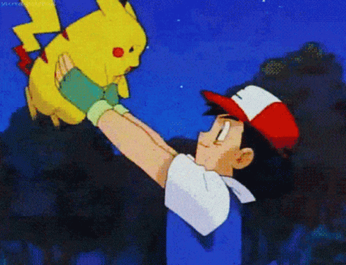 A Man In A Red White And Blue Hat Is Holding A Yellow Pikachu GIF