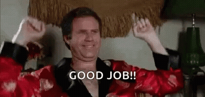 A Man In A Robe Is Celebrating With His Arms In The Air And Says `` Good Job '' . GIF