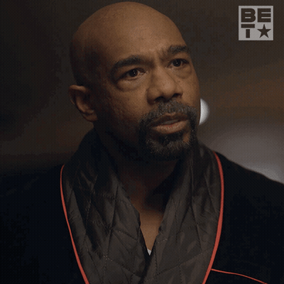 A Man In A Robe Says Tell Me What Happened While Pointing GIF