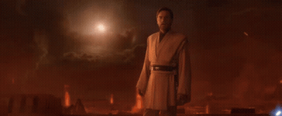 A Man In A Robe Stands In A Dark Room With The Words " Only A Sith Deals In Absolutes " Above Him GIF