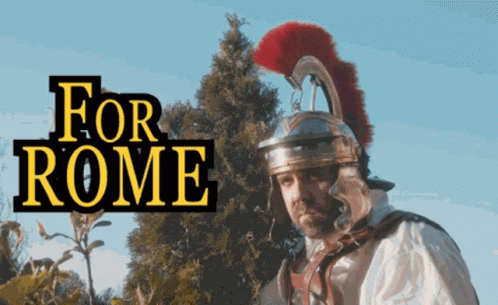 A Man In A Roman Helmet Stands In Front Of A Sign That Says " For Rome " GIF