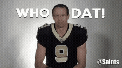 A Man In A Saints Jersey Is Standing In Front Of A White Background And Says Who Dat ! GIF
