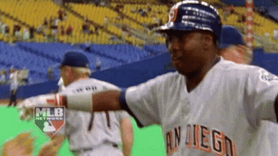 A Man In A San Diego Baseball Uniform Is Standing On A Baseball Field GIF