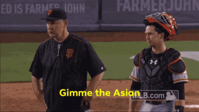 A Man In A San Francisco Giants Uniform Stands Next To A Catcher GIF