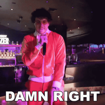 A Man In A Santa Suit Is Standing In Front Of A Sign That Says " Damn Right " GIF