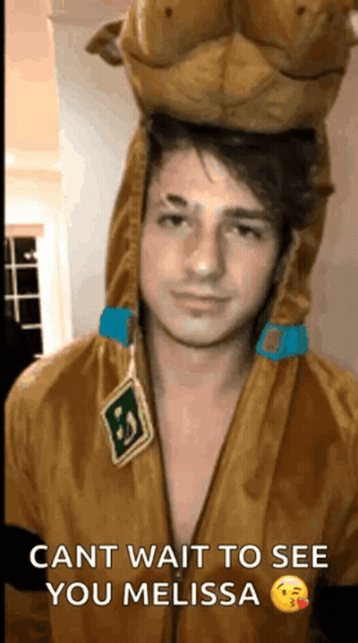 A Man In A Scooby Doo Costume Is Waiting To See His Girlfriend . GIF