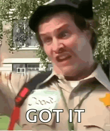 A Man In A Scout Uniform Is Making A Funny Face With The Words `` Got It '' Written On His Shirt . GIF