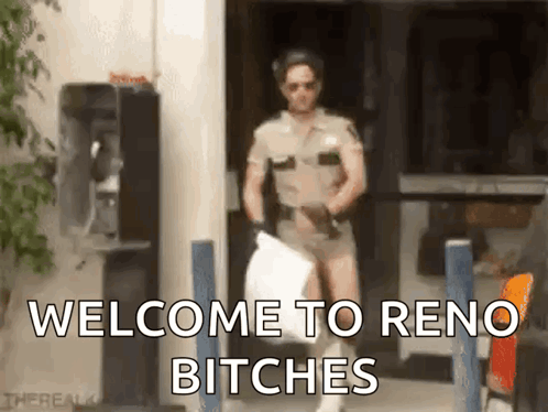 A Man In A Sheriff 'S Uniform Is Holding A White Bag And Says Welcome To Reno Bitches GIF