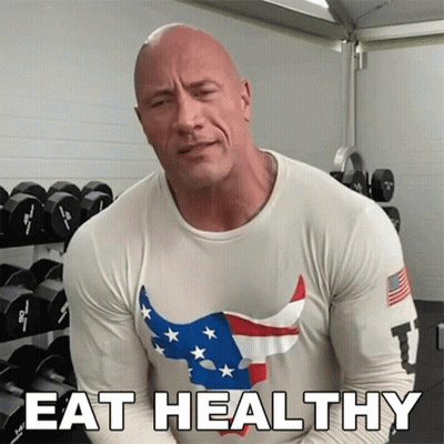 A Man In A Shirt That Says Eat Healthy GIF