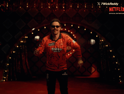 A Man In A Shree Cement Shirt Is Dancing GIF