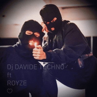 A Man In A Ski Mask Is Lighting A Cigarette Next To A Woman Wearing A Ski Mask GIF