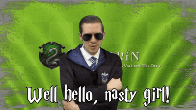 A Man In A Slytherin Uniform Is Standing In Front Of A Green Background That Says Well Hello Nasty Girl GIF
