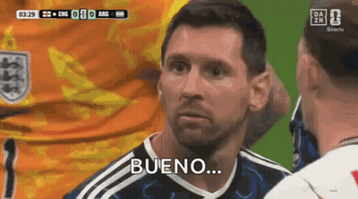 A Man In A Soccer Uniform Is Talking To Another Man And Says Bueno . GIF
