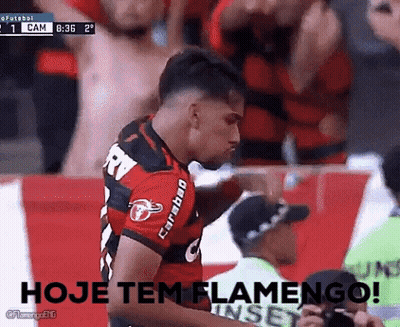 A Man In A Soccer Uniform Says Hoje Tem Flamengo In Front Of A Crowd . GIF