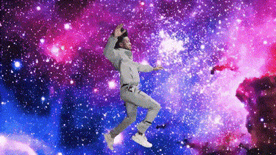 A Man In A Space Suit Is Flying Through The Air GIF