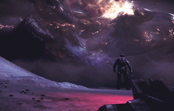 A Man In A Space Suit Is Standing In Front Of A Mountain Range GIF