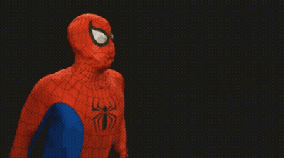 A Man In A Spider Man Costume Is Covered In A Spider Web GIF