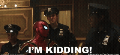 A Man In A Spider Man Suit Says I 'M Kidding In Front Of Two Police Officers GIF